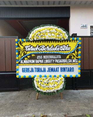 Papan Bunga Duka di Dadi Mulya